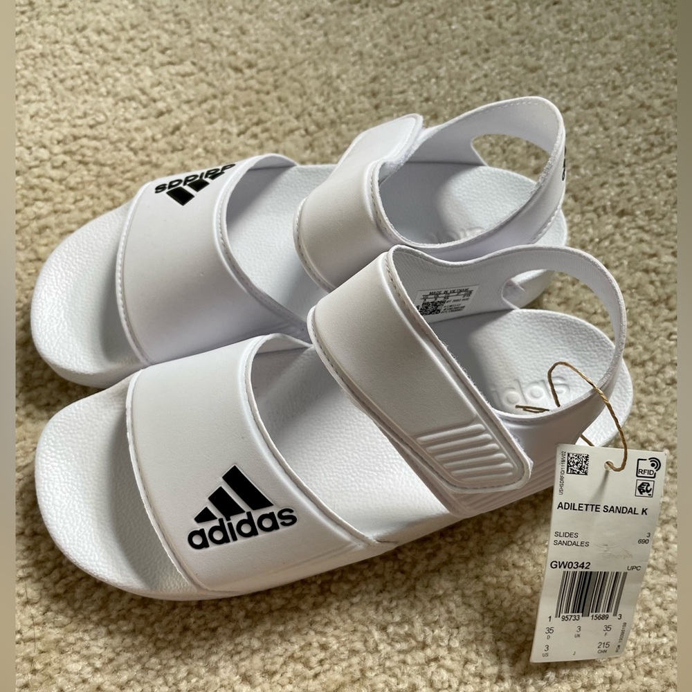 Brand new Adidas sandal, unisex, Big Kid size 3. Final sale.